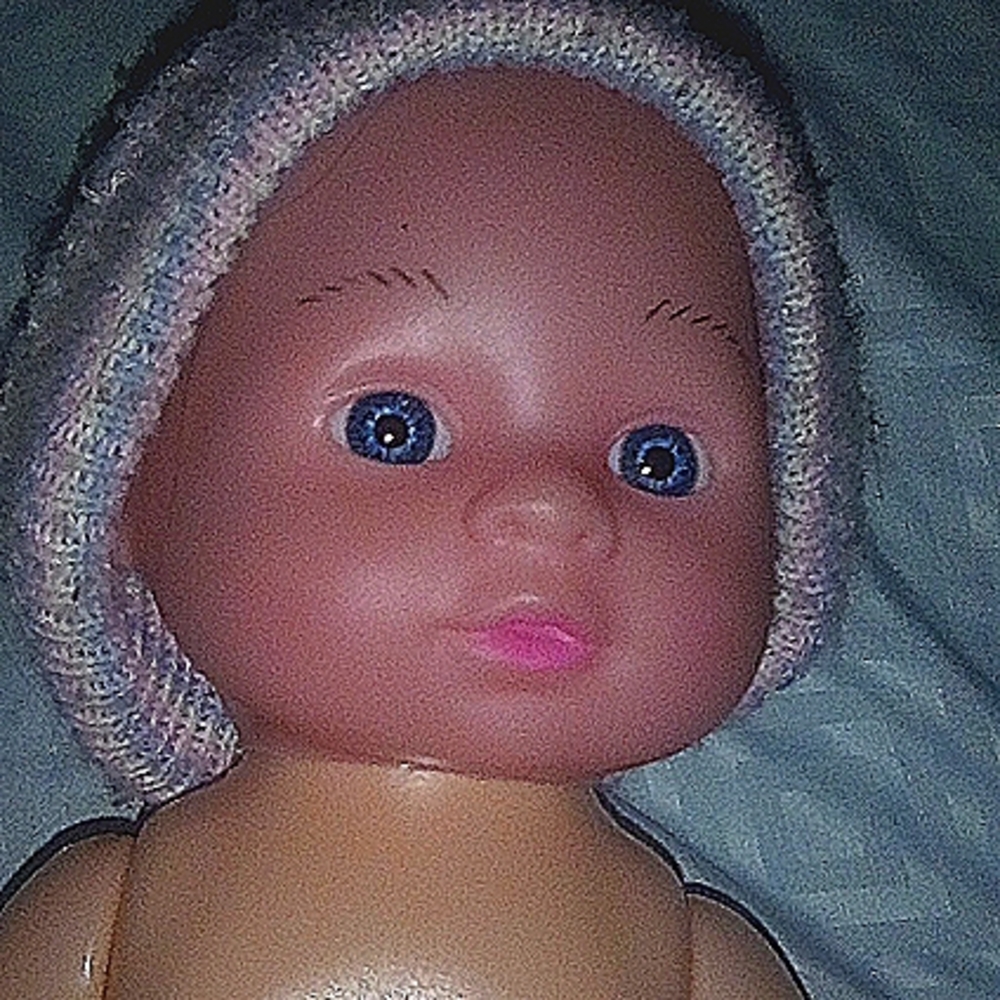 Cute toddler learning doll